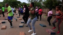 FILE - People exercise inside Warren Hills cemetery in Harare, Zimbabwe, November 24 ,2022. (REUTERS/Philimon Bulawayo)