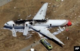 US Officials Blame Crew, Auto Systems in Asiana Crash