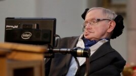 In this March 6, 2017, file photo, Stephen Hawking receives the Honorary Freedom of the City of London. Cambridge University has put Hawking's doctoral thesis online 