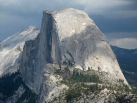 Half Dome and Yosemite Valley in a view from Glacier Point at Yosemite National Park, California