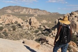 A hiker along the Hidden Valley trail, Joshua Tree National Park