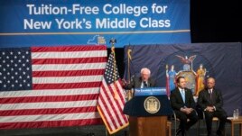 Senator Bernie Sanders, left, is joined by New York Governor Andrew Cuomo, center, and Chairperson of the Board of Trustees of The City University of New York William C. Thompson, as he speaks about a proposal for free tuition at state colleges.