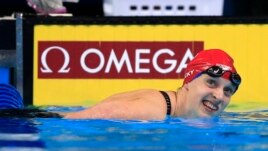 Katie Ledecky smiles after winning the women's 200-meter freestyle final at the U.S. Olympic swimming trials in Omaha, Neb., Wednesday, June 29, 2016.