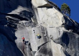 Kevin Jorgeson, left, and Tommy Caldwell climb El Capitan, Wednesday, Jan. 14, 2015, as seen from the valley floor in Yosemite National Park