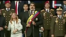 Venezuelan President Nicolas Maduro reacts during an event that was interrupted, reportedly by explosives from drones, in this still frame taken from government video, Aug. 4, 2018, in Caracas, Venezuela. VENEZUELAN GOVERNMENT TV/Handout via REUTERS TV