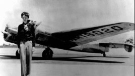 Amelia Earhart, 40, stands next to a Lockheed Electra 10E, before her last flight in 1937 from Oakland, Calif., bound for Honolulu on the first leg of her record-setting attempt to circumnavigate the world westward along the Equator. (AP Photo)