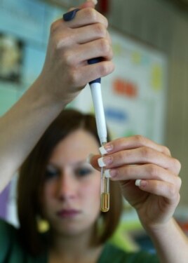 Brielle Hicks prepares to test the biodiesel fuel in a laboratory at Sinclair Community College in Dayton, Ohio.