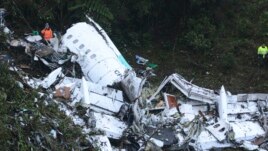 Rescue workers at the wreckage of an airplane that was carrying the Brazilian soccer club Chapecoense when it crashed outside Medellin, Colombia, Nov. 29, 2016. 