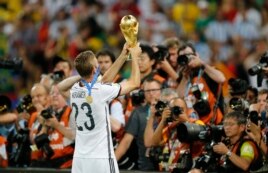 Christoph Kramer of Germany celebrates the World Cup title with fans in 2014. He missed most of the game due to a concussion.