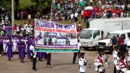 Kenyan workers march during the Labour Day Celebration Parade at Uhuru Park, Nairobi, Kenya, Monday, May 1, 2017. Large crowds gathered in Uhuru Park Monday to mark the International Labour Day. (AP Photo/Sayyid Abdul Azim)