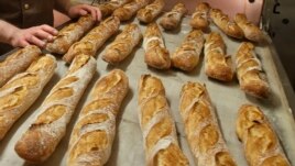 FILE - Baguettes are seen as they come out of the oven of the bakery La Parisienne in Paris, Friday, March 18, 2016. The bread has been recognized by UNESCO.
(AP Photo/Michel Euler/File photo)