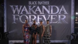 Florence Kasumba, from left, Danai Gurira, Letitia Wright and Lupita Nyong'o pose for photographers upon arrival for the premiere of the film 'Black Panther: Wakanda Forever' in London, Thursday, Nov. 3, 2022. (Photo by Vianney Le Caer/Invision/AP)