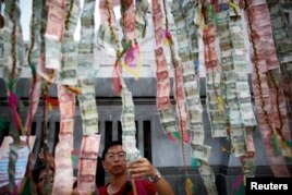 Corruption in Asia Slows Economic Growth