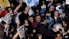 People rally in support of press freedom in Istanbul in October. Other groups have protested against media they say is anti-government. (AP Photo/Isa Simsek, Zaman)