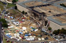 The Pentagon attack site is shown Friday, Sept. 14, 2001, after a plane slammed into the building on Tuesdady, Sept. 11. The terrorist attack caused extensive damage to the west face of the building. (AP Photo/Tech. Sgt. Cedric H. Rudisill)