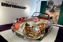 Singer Janis Joplin's painted 1964 Porsche 356C Cabriolet car for sale at Sotheby's in New York, Dec. 4, 2015. (AP Photo/Richard Drew)