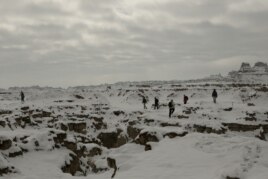 Youth Camp Participants Explore the Door Trail in the Snow (NPS / Dudley Edmondson)