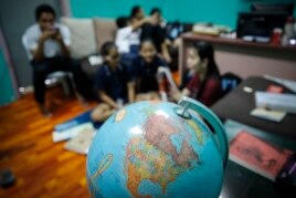 Christian Burmese refugees sit in a classroom in Kuala Lumpur, Malaysia, M arch 11, 2017.