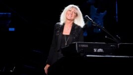 FILE - Christine McVie from the band Fleetwood Mac performs at Madison Square Garden in New York on Oct. 6, 2014. McVie, the soulful British musician who sang lead on many of Fleetwood Mac's biggest hits, has died at 79. (Photo by Charles Sykes/Invision/AP, File)