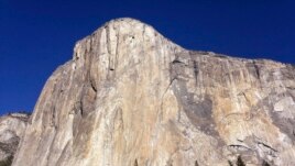 This photo shows El Capitan in Yosemite National Park, Calif. An American rock climber has become the first to climb alone to the top of the wall without ropes or safety gear.