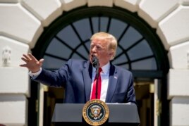 President Donald Trump speaks during a Made in America showcase on the South Lawn of the White House in Washington, Monday, July 15, 2019. (AP Photo/Andrew Harnik)