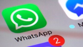 WhatsApp appears on a smartphone, March 10, 2017, in New York.