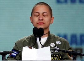 Emma Gonzalez, a survivor of the mass shooting at Marjory Stoneman Douglas High School in Parkland, Fla., closes her eyes and cries as she stands silently at the podium for the amount of time it took the Parkland shooter to kill 17 students.