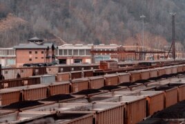 The Norfolk Southern Rail yard is a reminder that coal is still king in Williamson, W.Va., Thursday, Nov. 29, 2018, (AP Photo/Tyler Evert)