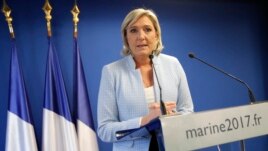 France 2016 US Election: French far-right leader Marine le Pen makes a statement on the presidential election in the United States of America, Wednesday Nov. 9, 2016 in Nanterre, outside Paris. A French outsider with an anti-system agenda, far-right leade