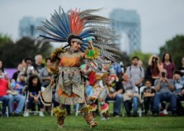 A dancer performs at an Indigenous Peoples' Day Festival in New York, Oct. 2017.