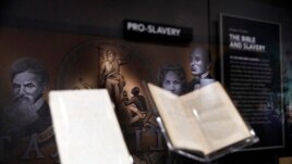 An exhibit discussing slavery in the United States is displayed inside the Museum of the Bible, Monday, Oct. 30, 2017, in Washington. (AP Photo/Jacquelyn Martin)