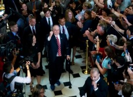 House Republican Whip Steve Scalise walks with his wife Jennifer, left, as he leaves the House chamber in the Capitol.