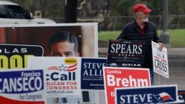 FILE - Election signs in San Antonio, Texas on Feb. 20, 2018. (AP Photo/Eric Gay)