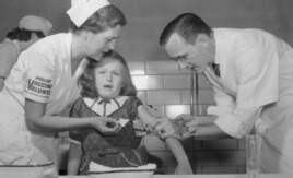 In 1954 this child in Virginia is vaccinated with the new Salk polio vaccine. Today, only 3 countries in the world have never stopped spread of polio. They are Pakistan, Afghanistan and Nigeria.(AP File Photo)