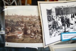 Images showing long-since disassembled oil derricks covering the land of 1920's New Straitsville is displayed at the New Straitsville History Group Museum, Thursday, Dec. 14, 2017, in New Straitsville, Ohio.
