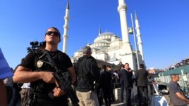 A Turkish special security force member stands during a mass funeral for the victims of a failed military coup last Friday, at Kocatepe Mosque in Ankara, Turkey, July 17, 2016.