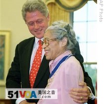Rosa Parks and President Clinton after he presented her with the Presidential Medal of Freedom in 1996