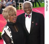 Celia Cruz and her husband Peter Knight enter the Latin Billboard Awards in  2002