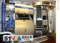 A picture of the whole robotic milking system