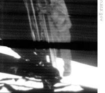 Neil Armstrong steps onto the moon