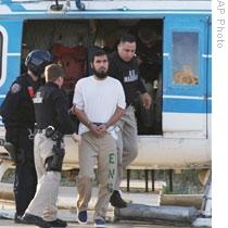 A police department photo of Najibullah Zazi arriving in New York City to face terrorism charges 