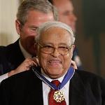 Benjamin Hooks receiving the Presidential Medal of Freedom from George W. Bush