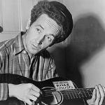 Woody Guthrie sang songs describing the conditions at the farm worker camps that he was visited.