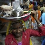 A woman sells henna at a festival in Jammu, India last year.  A micro-loan could help expand her business