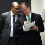 David Axelrod, left, talks with Robert Gibbs